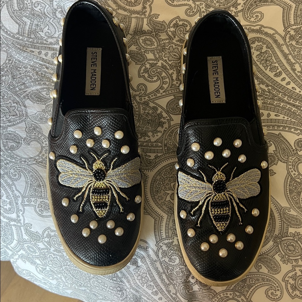 Steve Madden Black Slip-On Shoes with Bee Design